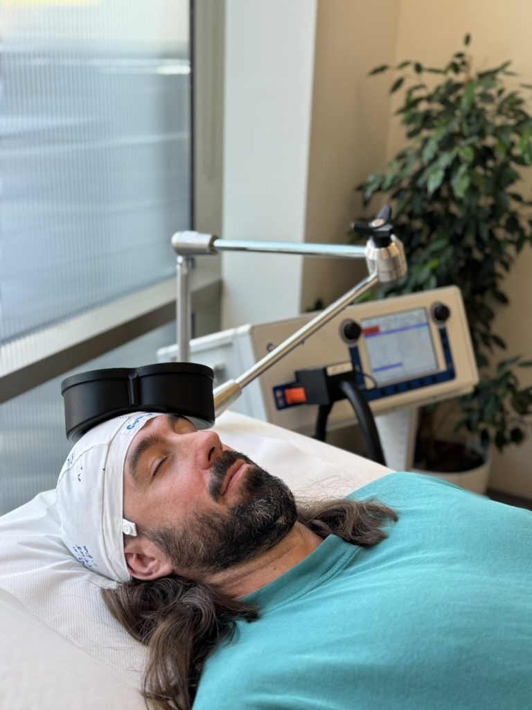 A patient lying back calmly during treatment